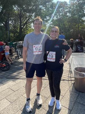 Dr. Christopher Kellner, MD (the neurosurgeon who saved her life) and Julie Brothers, Brain Aneurysm Survivor & Advocate taking a photo together at the Brain Aneurysm Foundation NYC Run/Walk in September 2024.